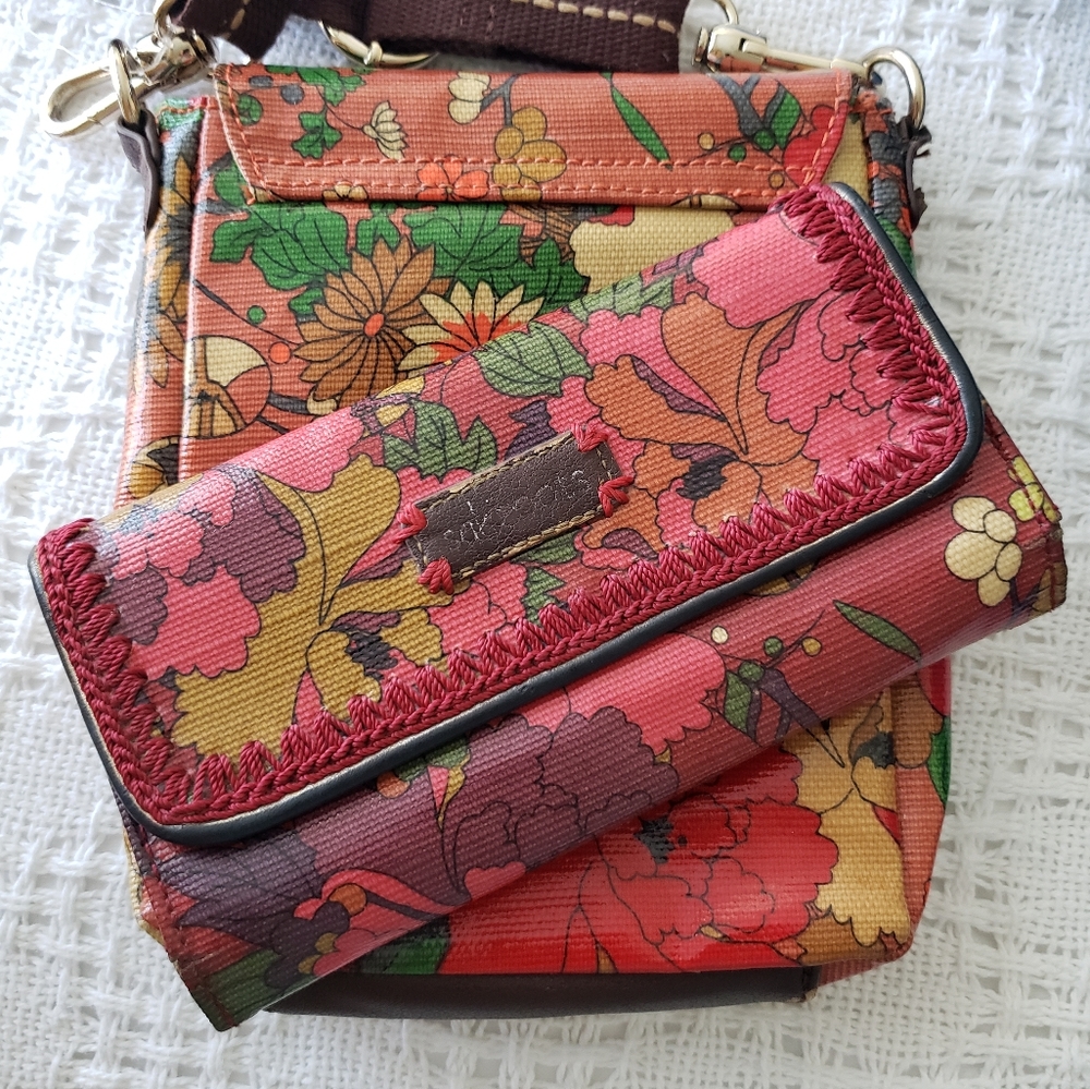 Sakroots wallet with floral laminate boho pattern